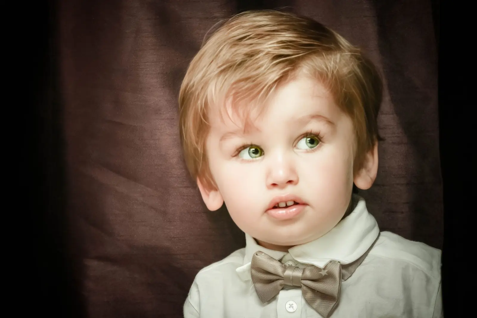 Photographe anniversaire essonne portrait enfant noeud papillon