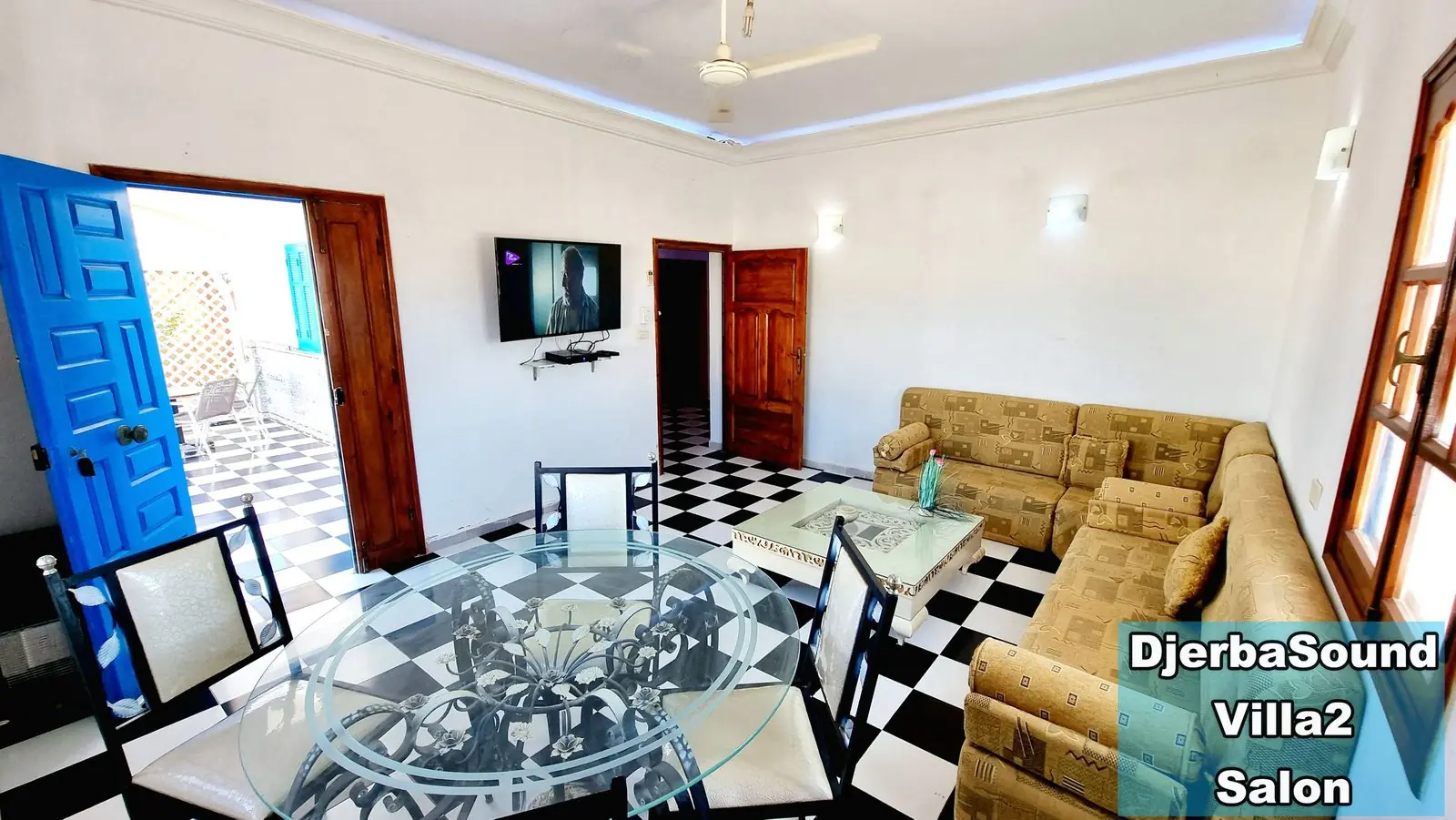 Location villa milka djerba salon tv porte bleue terrasse sans vis a vis