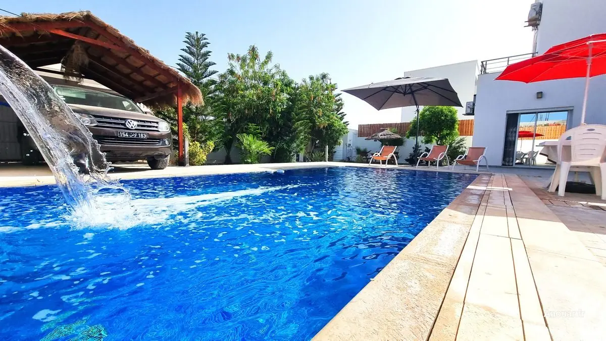 Location villa djerba midoun piscine jet eau parking couvert