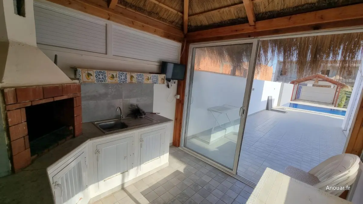 Location villa djerba midoun piscine paillote barbecue mini cuisine